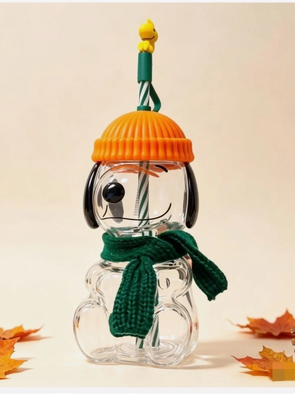 Clear Snoopy-Style Glass Dog Water Bottle with Orange Beanie and Green Scarf